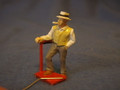 PAINTED PEWTER MAN SMOKING PIPE WITH FOOT ON SCALE O GAUGE
