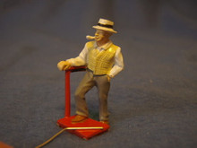 PAINTED PEWTER MAN SMOKING PIPE WITH FOOT ON SCALE O GAUGE