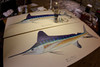 The roundscale spearfish is a companion piece to the white marlin painting Karen completed at the same time. Here the originals are both pictured together.