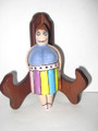 Woman Drawer Pull in Purple top & Multicolor skirt