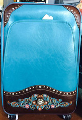 Three piece turquoise Luggage set with rollers.  2 suitcases and one carry on. 