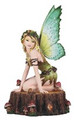 GSC91964 - 10" 10" Green Fairy Sitting on Tree Trunk