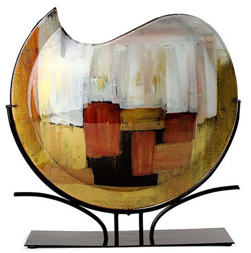 Yellow, red, black and white are featured on this partly round fused glass vase