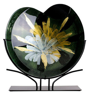 Full blooms in white and yellow gold spread from the center of this 20" round vase