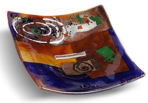 8 inch square blue glass platter featuring red and brown fused glass, touches of green and other colors and a white spiral