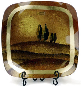13in square fused glass platter featuring brown fields, hills and trees on the horizon.  Hand painted metallic gold borders near the edge
