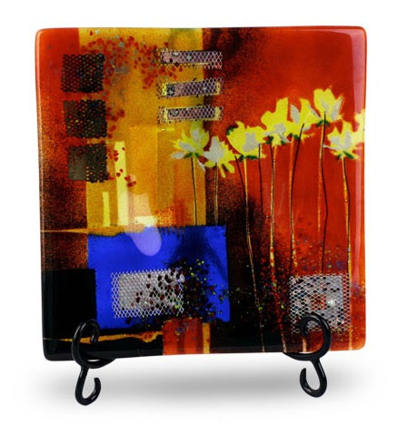 12" square, red fused art glass platter, featuring a blue blocking, orange and black details and yellow flowers