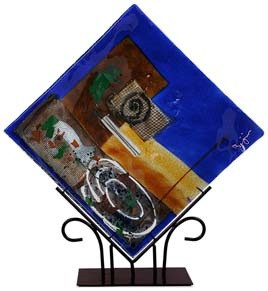 15" square fused glass platter featuring blue, yellow, red glass, with abstract designs and a white spiral