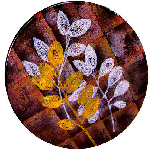 Beautifully detailed arrangement of leafed branches are featured in this fused glass cafe table
