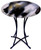 Round fused glass cafe table, featuring black and white with gold highlights along with copper metallic squares