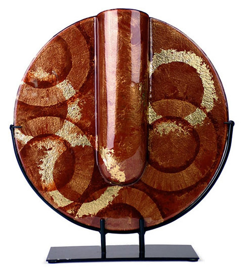 The Golden Ring round vase features red background of fused glass, with gold and black hand painted rings