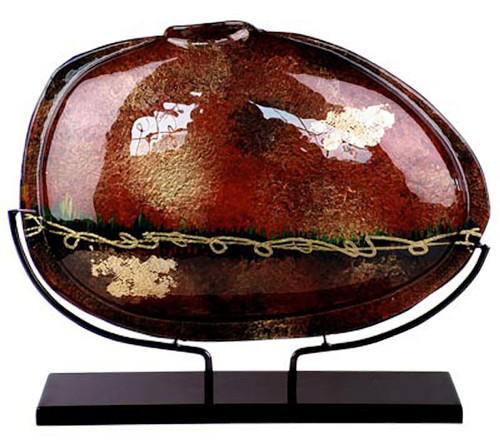 This 19 inch fused glass oval vase hand black, red and gold, and is in the Maroon Vines series.  Stand included