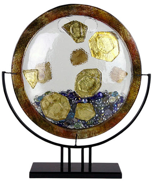 A round fused glass vase, with a bronze-like border, clear vessle and gold nugget appliques,  blue and green marbles, and stand included