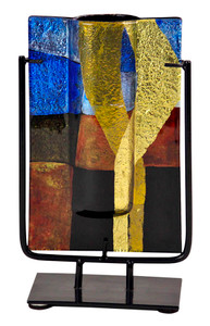 Another fused glass vase from our Field series, this rectangular vase includes abstract geometric images in browns, blues and black, as well as handpainted metallic gold details.  Stand included
