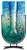 Marine colors are featured in this U-shaped fused glass vase with blue and green, along with many other colored pieces fused in place.  Stand included