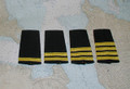Epaulet with stripes only.