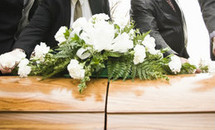 SIMPLE WHITE PEACEFUL CASKET SPRAY