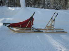 This double driver has a sled bag added as well.  Basket style.