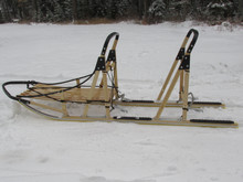 Double driver tandems are available in basket (left) and toboggan (below left).  Seats can be added to any sled in front, middle or back.  Most tour operators use the toboggan style double driver.