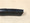 Showing engraved text listing compatible rifle, capacity and maker name.