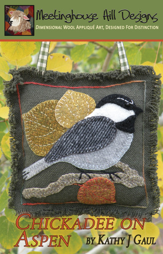 Chester, the Chickadee resting on a branch amongst the changing leaves of our aspen tree!  