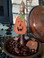 Here's Jack as a candle topper!  Candle, rusty embellishments and candle stand with rusty pumpkin, all available on our webstore!