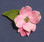 A dimensional dogwood blossom!  Wire adds "shape-ability" to these petals.  Makes a great pin, name tag or taper topper". 