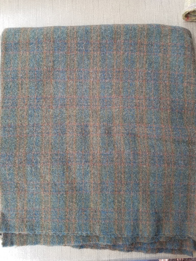 Felted wool - 1 yard 
Piece measures approximately 52" x 32" (shrinkage due to washing/felting).
