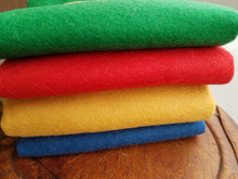 100% American-made Wool FELT - non woven fabrics.  4 fat quarters, each sized 18" x 18".  (A yard of wool felt measures 36" x 36".)
