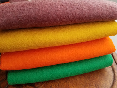 100% American-made Wool FELT - non woven fabrics.  4 fat quarters, each sized 18" x 18".  (A yard of wool felt measures 36" x 36".)