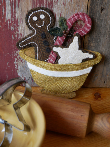 Traditions of baking with my Auntie Von, who also taught me to sew, are the memories that came to life when I created this design.  Honored to be featured for the first time in Early American Life magazine with a wool applique design for their readers!  Each cookie, candy and yellowware bowl can be displayed separately, or in combination as displayed.  
This kit includes all the felted wools and all the hand dyed "The Gentle Art-Wool Threads" for stitching.  Christmas 2021 issue of Early American Life magazine is required for pattern and instructions.  