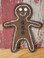 A ginger who looks good enough to eat - but he's made of wool, so he would not taste very good!  Decorated with boucle thread for his icing!