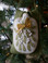 Hung within the branches of our tree, "Mistletoe".  Fill the burlap sack with dried spices or balsam fir tips for a wonderful aroma! "Mistletoe and Holly" by Meetinghouse Hill Designs.
The appliqued and embroidered oval may be backed with another oval wool layer and made into its own ornament!