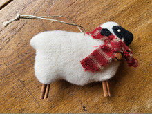This Wooley ornament is hand made by the designer!  Kits are also available.