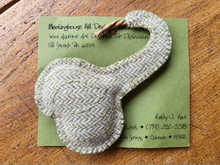 This pale green and off white Swan Gourd is hand made by the designer!  Pattern, "Fall Harvest" is also available.