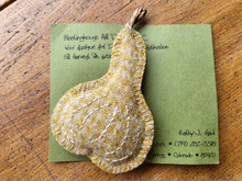 This pale gold and off white Gourd is hand made by the designer!  Pattern, "Fall Harvest" is also available.