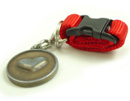 Removable Pet ID Tag Holders Make it a Snap to Move ID Tags from One Collar to Another.