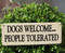Make your position know with one of these "Dogs Welcome...People Tolerated" wood signs made in U.S.
