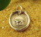 An antique wax seal is used to create our faithful dog charms.