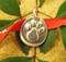 Each paw charm is beautifully imperfect due to the handmade nature.