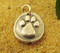 Raised paw print charms are handmade by Tracy Menz Designs