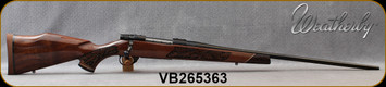 Weatherby - 300WinMag - Vanguard Lazerguard - AA-grade Claro Walnut, Lazer engraved w/traditional oak leaf pattern/Blued, 26"Barrel, #2 Contour, Adjustable Match Quality, Two-stage Trigger, 1:10", Mfg# VGZ300NR6O, S/N VB265363