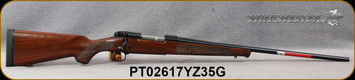 Winchester - 264WM - Model 70 Featherweight - Satin finish walnut stock w/classic Featherweight cut checkering & Schnabel fore-end/Blued, 24"Free-floating Featherweight profile barrel, Mfg# 535200229, S/N PT02617YZ35G