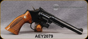 Consign - Smith & Wesson - 22LR CTG - Model 17-4 - Revolver - Walnut Grips/Case Hardened Hammer & Trigger/Blued Finish, 6"Barrel, c/w spare walnut grips