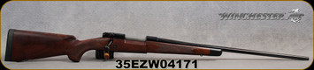 Used - Winchester - 270Win - Model 70 Super Grade - Grade IV/V walnut, ebony forearm tip/Polished Blued, 24"Barrel, jeweled bolt body, very low rounds fired, Mfg# 535203226 - in original rifle box