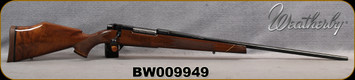 Consign - Weatherby - 257WbyMag - Mark V Deluxe - Gloss Finish AA Claro Walnut Stock w/Rosewood Forend Tip & Maplewood Spacers/Blued Finish, 26"Barrel - only 50rds fired - in green gun sock