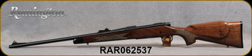 Remington - 30-06Sprg - Model 700 BDL "Custom Deluxe" - Bolt Action Rifle - High Gloss Walnut Stock/Blued, 22" Barrel, 4 Rounds, Mfg# R25793, S/N RAR062537