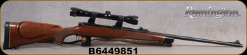 Used - Remington - 7mmRemmag - Model 700 BDL - Left Hand- Walnut Monte Carlo Stock w/Ebony Forend Tip/Blued Finish, 24"Barrel, c/w Bushnell Scopechief VI, Plex reticle, leather sling