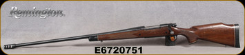 Used - Remington - 7mmRUM - Model 700 LH - Walnut Monte Carlo Stock w/Ebony forend tip & grip cap/Blued Finish, 26"Threaded Barrel, aftermarket muzzle brake