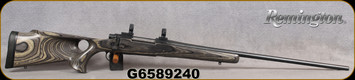 Consign - Remington - 300RUM - Model 700 LA - Grey Laminate Thumbhole Stock/Blued Finish, 26"Barrel, c/w Dual dovetail Leupold Base & Rings - less than 40 rounds fired